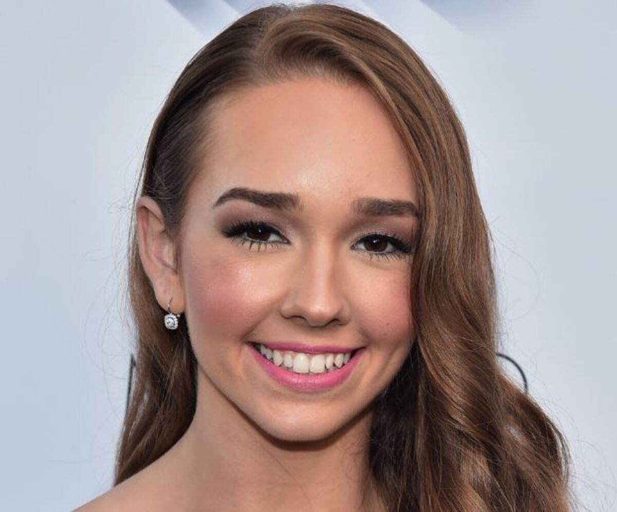 Holly Taylor posing for a photoshoot 